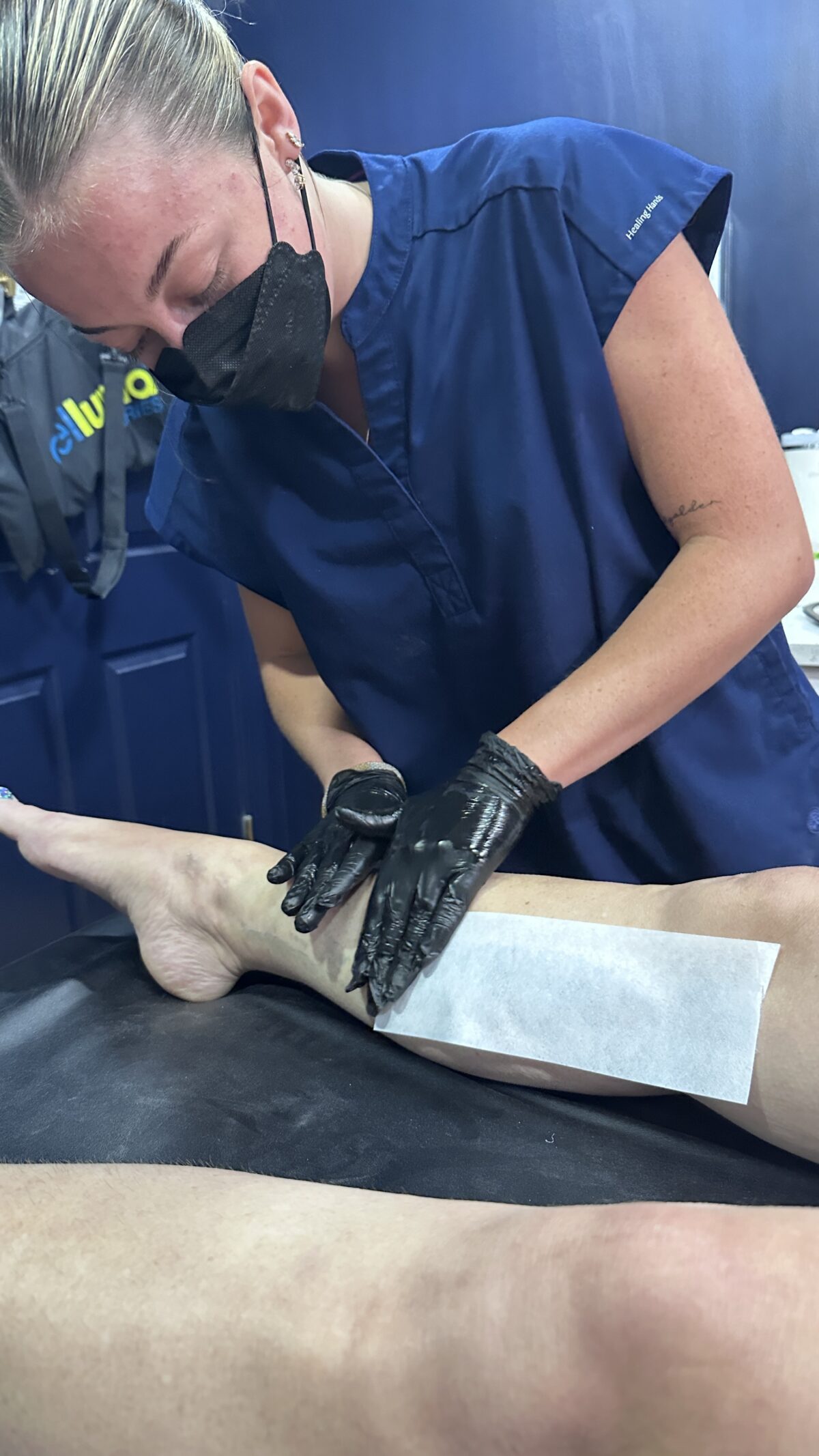 Oceana at Smoothe & Co., located in Raleigh, NC, is performing a full leg wax.